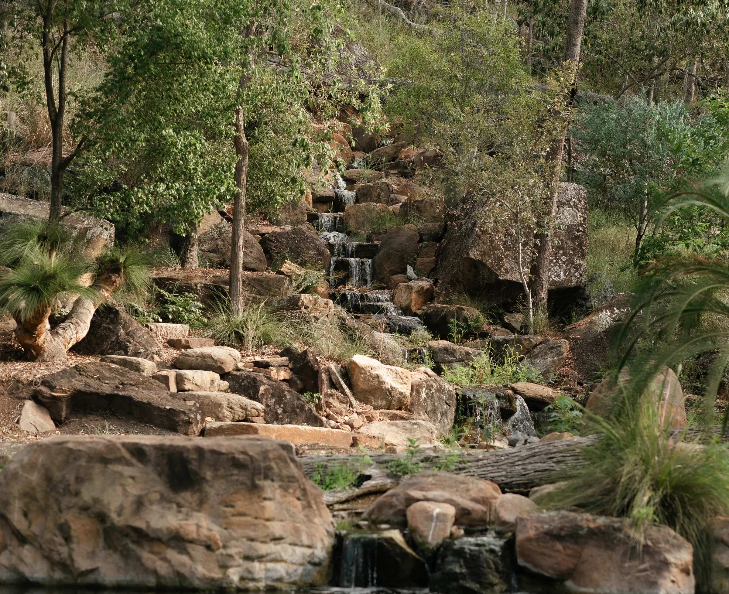 The rock waterfall and garden at the Ace of Spades property near Toowoomba